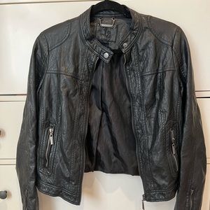Black faux leather jacket with zippers